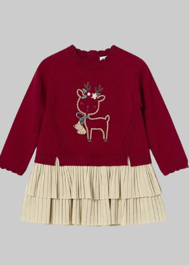 Mayoral Baby Girls Red and Gold Christmas Dress features a soft knit with long sleeves, ruffle collar, and reindeer appliqué. Back button fastening and tiered, pleated gold fleck skirt complete the festive look.