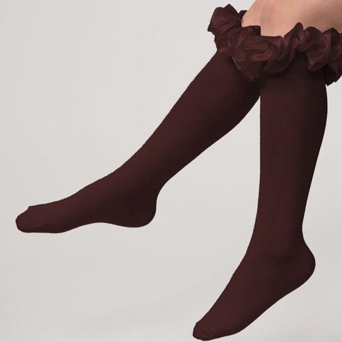 Brown knee-high socks with ruffles from Caramelo Kids.
