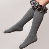  Grey knee-high socks with ruffles from Caramelo Kids.