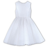 Sarah Louise Ceremonial Ballerina White Dress in a elegant sleeveless design with a V-Shaped back adorned with a pearl trim and a large bow.
