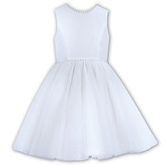 Sarah Louise Ceremonial Ballerina White Dress in a elegant sleeveless design with a V-Shaped back adorned with a pearl trim and a large bow.