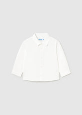 Classic white cotton shirt for baby boys. Long sleeves with button-down front. Soft, breathable fabric ideal for everyday wear or dressing up.