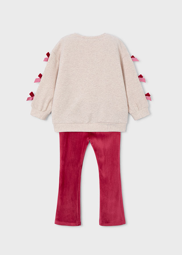 This charming set features a pullover with bows on the sleeves and leggings in a vibrant cherry hue, designed especially for girls by Mayoral