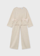 Mayoral Girls Knit Trouser Set in soft beige tones. A coordinated two-piece outfit featuring a comfortable knit construction, perfect for any occasion.