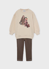 Mayoral Girls Coordinated two-piece outfit featuring a girls fashion print top paired with blotch print leggings. Perfect for everyday wear. Chestnut