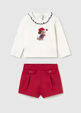 Mayoral baby girls long-sleeved tee with coordinating red twill shorts.