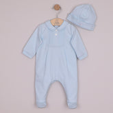 Emile et Rose Michael is a lovely baby boys’ outfit that represents traditional baby clothes at their best. A beautifully embroidered, square yoke with feather stitch embroidery and tiny vertical pintuck pleats, take centre stage. Framed by a little collar, two pearlised buttons and a cosy matching pull on hat add lovely finishing touches to this set.