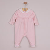 EMILE et ROSE Maddy is a beautiful baby girls babygrow in sumptuous pink velour. With its intricate flower embroidered, frilled inset yoke and pretty scalloped collar this is a very feminine outfit. Pink and white feet with little satin bows completes this gorgeous all in one.