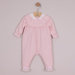 EMILE et ROSE Maddy is a beautiful baby girls babygrow in sumptuous pink velour. With its intricate flower embroidered, frilled inset yoke and pretty scalloped collar this is a very feminine outfit. Pink and white feet with little satin bows completes this gorgeous all in one.