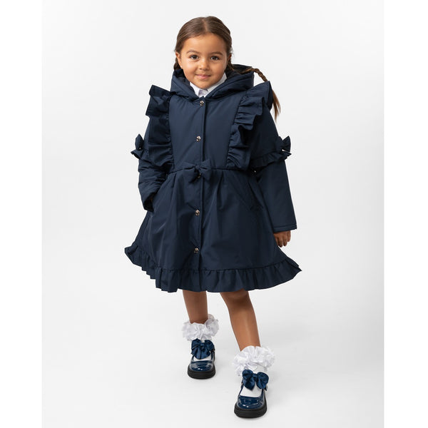 Navy skirted coat with frill detail from Caramelo Kids.