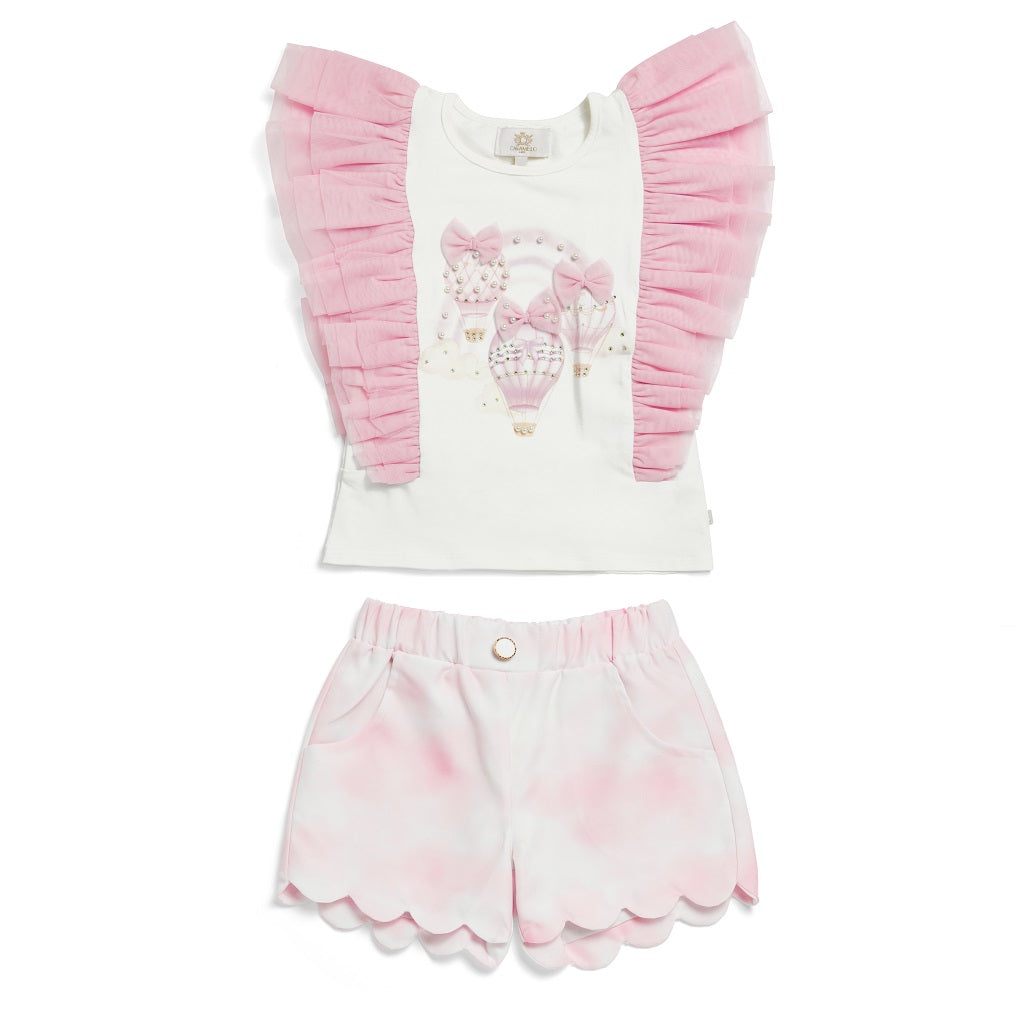 Caramelo Kids, the Fly Away Short Set features pink hues, adding a playful and enjoyable element.