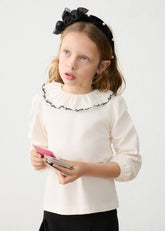 Mayoral girls cotton ruffled neckline blouse matched with pleated skorts in classic black