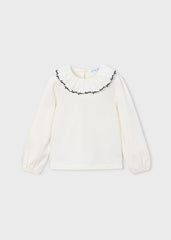 Mayoral girls cotton ruffled neckline blouse matched with pleated skorts in classic black