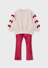 This charming set features a pullover with bows on the sleeves and leggings in a vibrant cherry hue, designed especially for girls by Mayoral