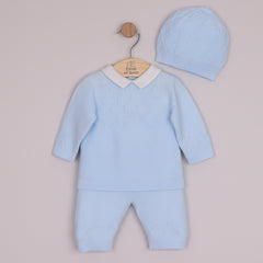 EMILE et ROSE Malachi soft knitwear in a pale blue knitted two piece. The main feature of this style is a textured criss-cross design across the chest. This pattern continues around the sleeves and the ankle of the leggings. Finishing touches include a crisp white collar, pearlised buttons , all topped off with a cute coordinating hat.