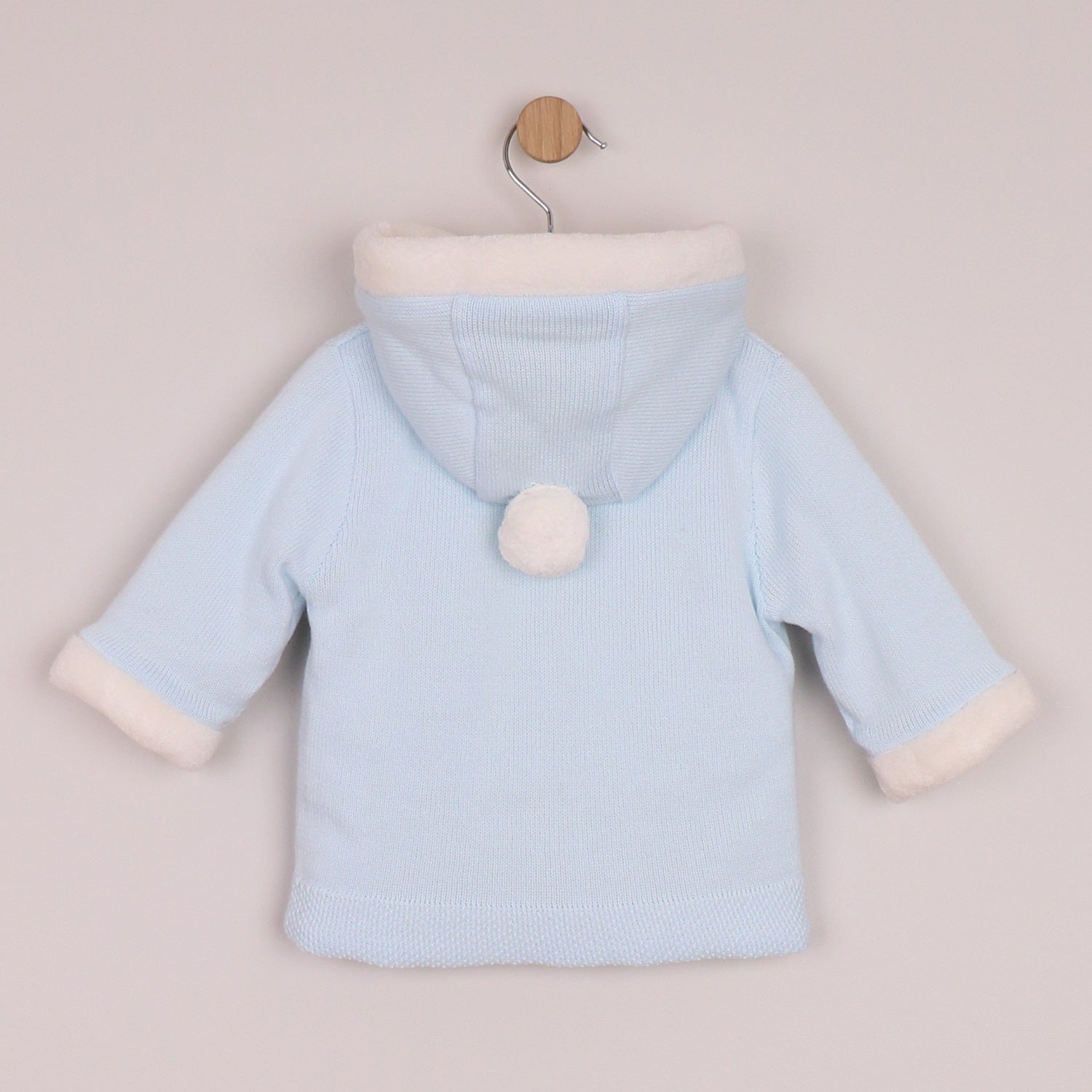 EMILE et ROSE This beautiful knitted, hooded jacket is a super cosy alternative to a coat.