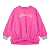 BONINI by ADee The Adapt sweatshirt features a graphic design front logo. Made from super soft cotton sweat, it features an oversize design and branded elasticated cuffs. Hot Pink