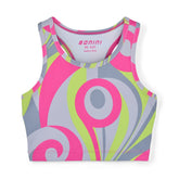 BONINI by ADee The Ignite Crop Top features a streamlined fit with a racerback design and bold swirl print for a vibrant, athletic look. Hot Pink