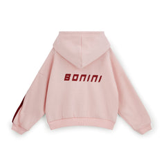 BONINI by ADee The Revive Hoodie features a relaxed fit with a cropped silhouette. Finished with signature Bonini branding, it’s perfect for layering or pairing with matching pieces for an effortless everyday look. Light Pink