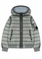 CP Company Kids Hooded shell jacket with adjustable hood, full zip fastening, side pockets, and C.P. Company's signature lens detail. Ribbed cuffs and hem. Regular fit.