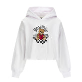 Optical white sweatshirt with hood for girls by the luxury Italian designer Moschino. Made from soft cotton, features the brands iconic Teddy Bear with red heart logo print on the front.