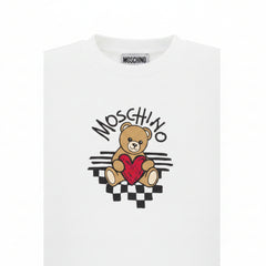 Optical White T-shirt girls by the luxury Italian designer Moschino. Made from soft cotton jersey, it features the bears brand's logo with heart print on the front.