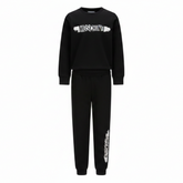 Moschino Kids Tracksuit in black, featuring logo print in white and black on the front of sweatshirt and also on the jogger trousers. Elasticated waistband and ribbed trims for comfort. Suitable for boys and girls.