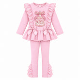 Giorgio Bambini girls pink two-piece outfit consisting of a long-sleeve ruffled top with a bow and carousel graphic with lace ruffles and matching leggings with lace ruffles cuffs.