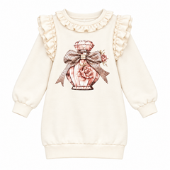 A charming dress from Giorgio Bambini featuring a perfume bottle design embellished with diamante detailing. Delicate pearl and ruffles add elegance.