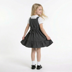 LELLI KELLY Becky Grey School Pinafore featuring a charming bow detail on the back and charm with LELLI KELLY logo on the front