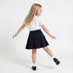 LELLI KELLY Bailey Navy Skirt, featuring the signature charm branding logo