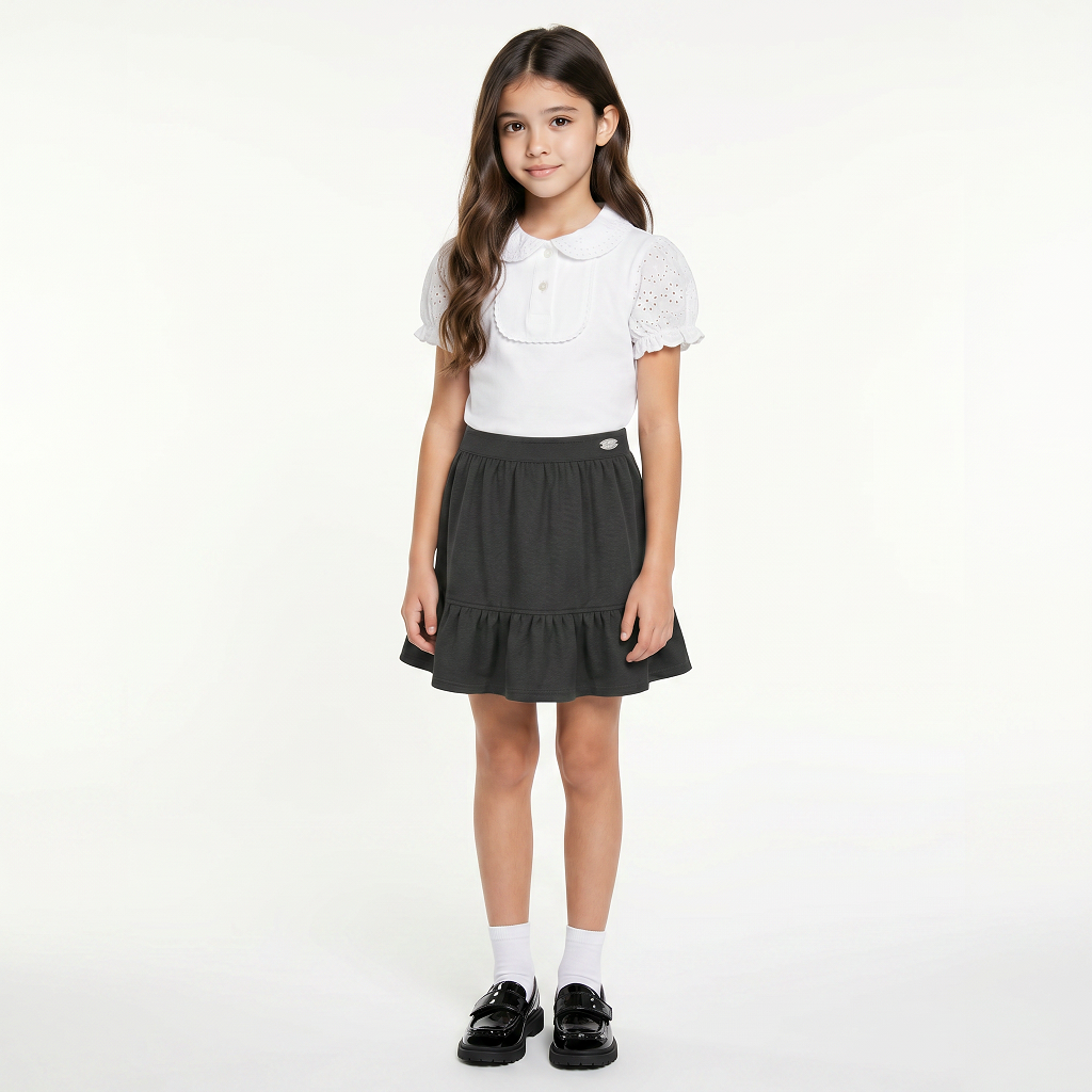 LELLI KELLY Betty Grey Skirt combine style with practical comfort. These charming skirts feature a decorative bow detail on the back and an iconic LELLI KELLY logo charm
