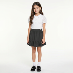 LELLI KELLY Betty Grey Skirt combine style with practical comfort. These charming skirts feature a decorative bow detail on the back and an iconic LELLI KELLY logo charm