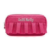 Pink pencil case with ruffled bottom and 'Lelli Kelly' branding.