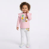 Moschino long sleeved top with teddy bear print with balloons on the front, long sleeves, press-stud fastening on the shoulders, ruched armholes.