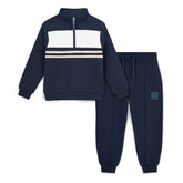 MITCH & SON Classic Collection. The Samson tracksuit features a sleek colour block design with a 1/4 zip top and coordinating joggers. Designed with elasticated trims for comfort and finished with understated logo detailing. Dark Navy