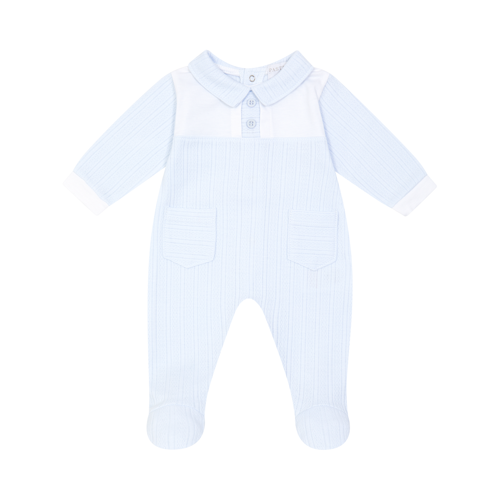 The Harry all-in-one in soft pale blue offers timeless elegance for baby boys, crafted by PASTELS & Co.