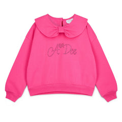 ADEE Winter Bloom Collection. The Amara Set features a sweatshirt with a beautiful bow collar and sparkling A*Dee diamante branding, paired with matching flares finished with a classic diamante “A” on one leg. Fuchsia
