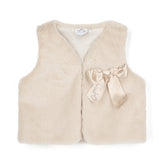 ADEE Eau-de Adee Collection. The Anna gilet come in fabulous faux fur and is finished with a beautiful appliqué bow on the chest. Stone Beige