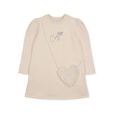 ADEE Eau de theme. The Alyssa dress features a faux fur applique handbag artwork, finished with a classic A*Dee diamanté logo. Stone Beige