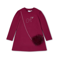 ADEE Chevron Charm Collection. The Alyssa dress features a faux fur applique handbag artwork, finished with a classic A*Dee diamanté logo. Deep Cherry