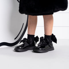 ADEE pixie ankle socks with a satin frill detail around the cuff, adding a touch of style to any outfit. Black