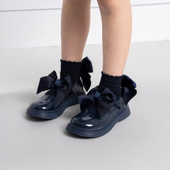 ADEE pixie ankle socks come in 3 classic colourways with a satin frill detail around the cuff, adding a touch of style to any outfit. Dark Navy