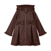 ADEE BTS The Nova is the must-have back to school raincoat! It features front and back pleats with pretty bow detailing, branding around the hem and frills at the cuffs and hood. Complete with a silver reflective logo badge on one arm and a silver branded puller. Brown