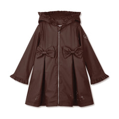 ADEE BTS The Nova is the must-have back to school raincoat! It features front and back pleats with pretty bow detailing, branding around the hem and frills at the cuffs and hood. Complete with a silver reflective logo badge on one arm and a silver branded puller. Brown