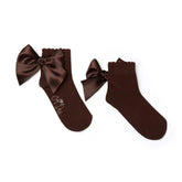 ADEE Finish your back to school outfit with the Cara ankle socks. Featuring a cute satin bows to the back. Brown