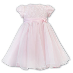 Sarah Louise Classic Ballerina Dress a beautiful tulle layer with hand-stitched lace, a satin ribbon and a delicate flower on the waistline.