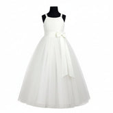 Linzi Jay White chiffon bodice with pretty bow detail on the waist and full tulle skirt. Zip up back. Style: FK051 White
