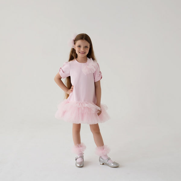 Daga - Ceremony Collection - short sleeve drop waist stretchy jersey dress with tulle ruffle hem, tulle diamante trim on the bodice is detachable. Pink