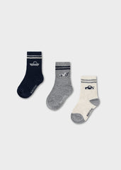 Mayoral baby boys striped socks set featuring playful car motifs across three pairs in white, blue, and grey.